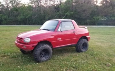 1996 Suzuki X-90 16v w/ 4″ Lift & Swampers